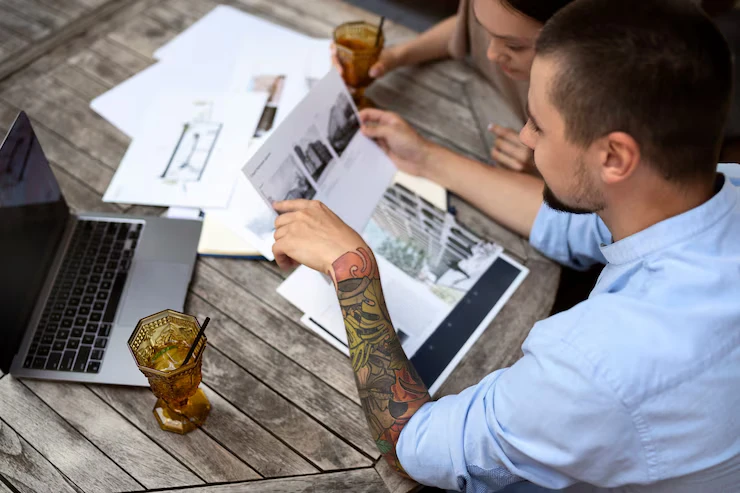 professionals reviewing lead generation strategies for plumbing business